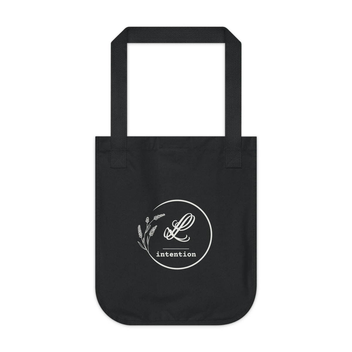 Back view of a black canvas tote bag featuring the LL Intention logo: “LL” in cursive above a horizontal line, with the word “intention” in typewriter-style font below, centered within a circular design accented by lavender flowers.
